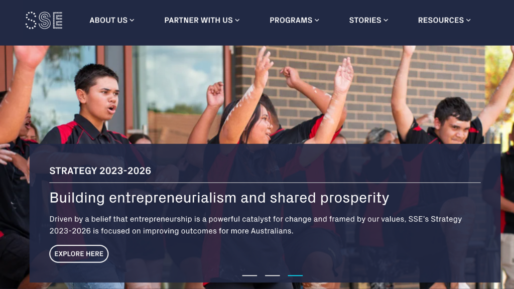 Screenshot of SSE homepage, navy blue with white text and featuring an image of a group of First Nations teenagers mid-dance.